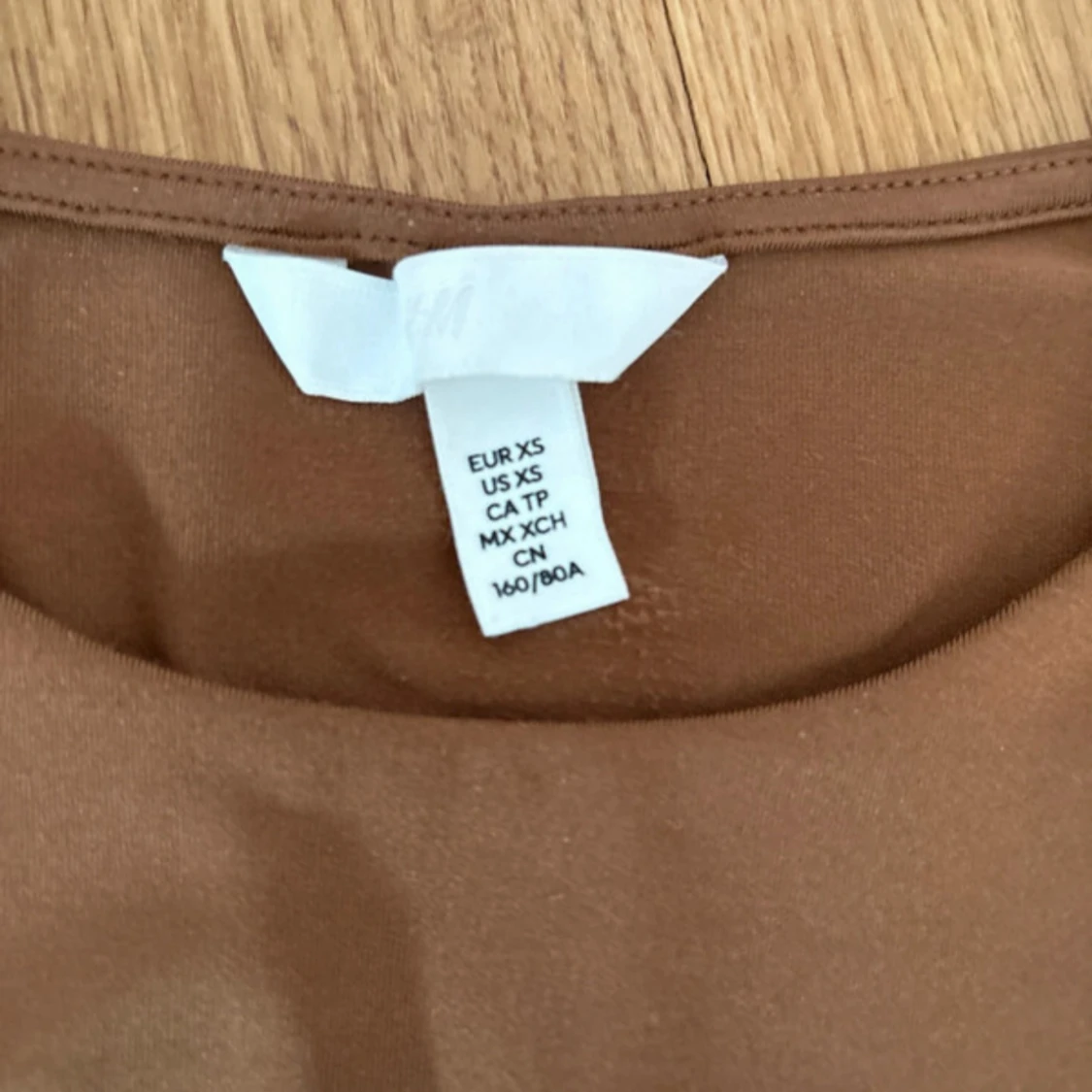 Brun långärmad bodysuit från H&M - 1