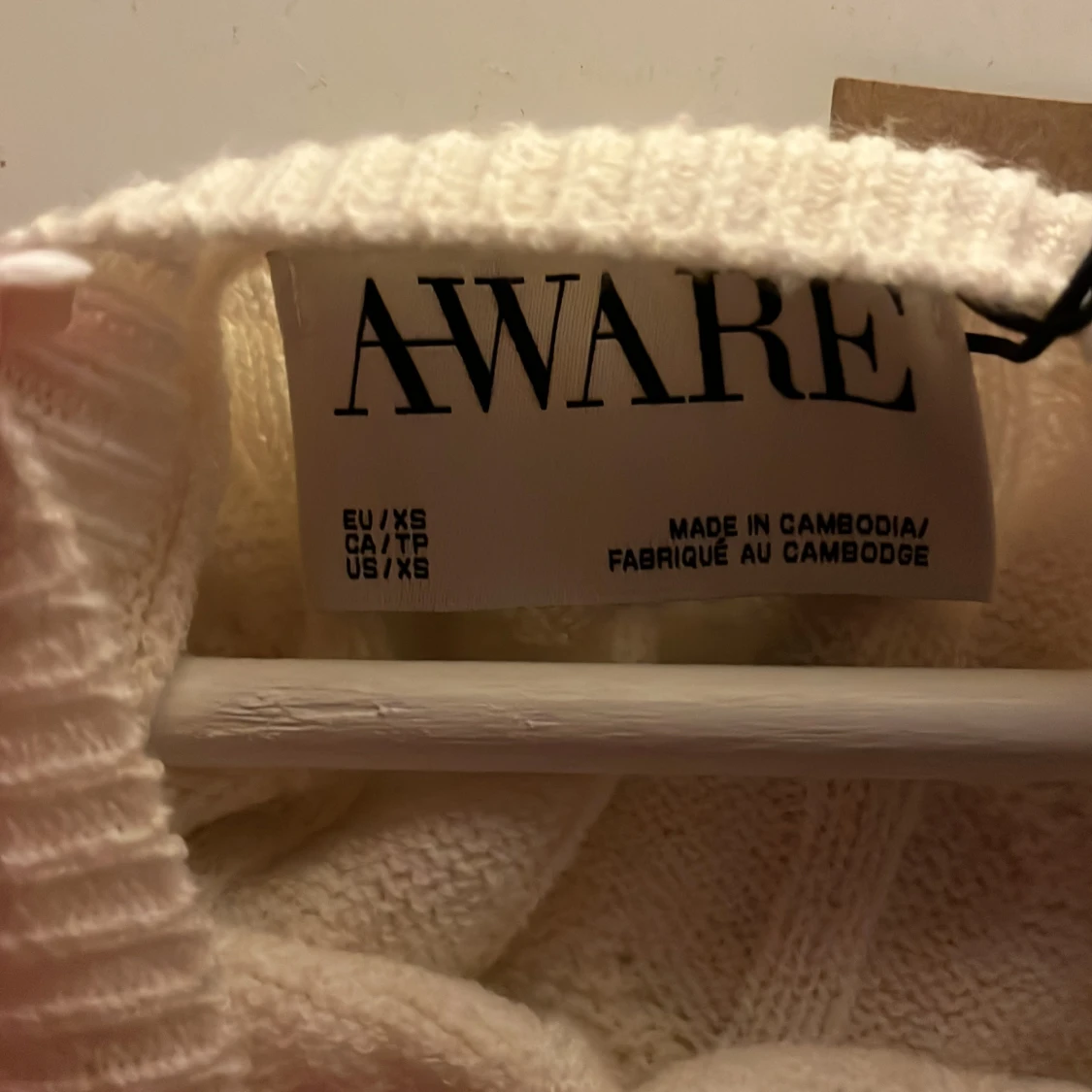 Krämvit stickad tröja från AWARE - 1