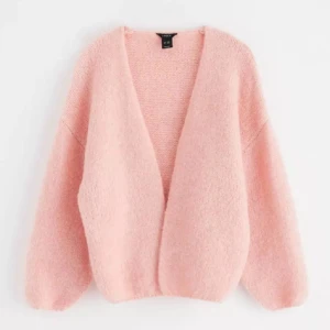 Stickad kofta - Rosa stickad kofta från Lindex.