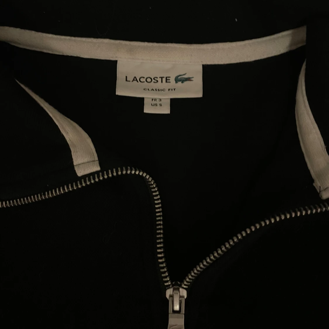 Svart half zip tröja från Lacoste - 1
