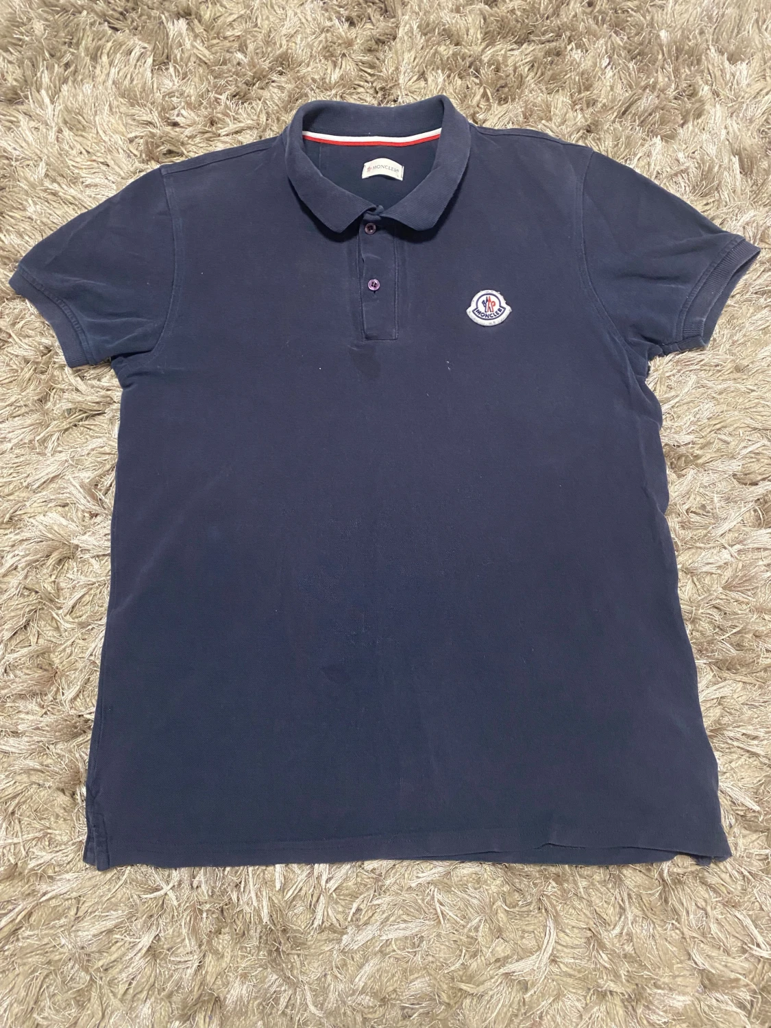 Mörkblå pikétröja från Moncler