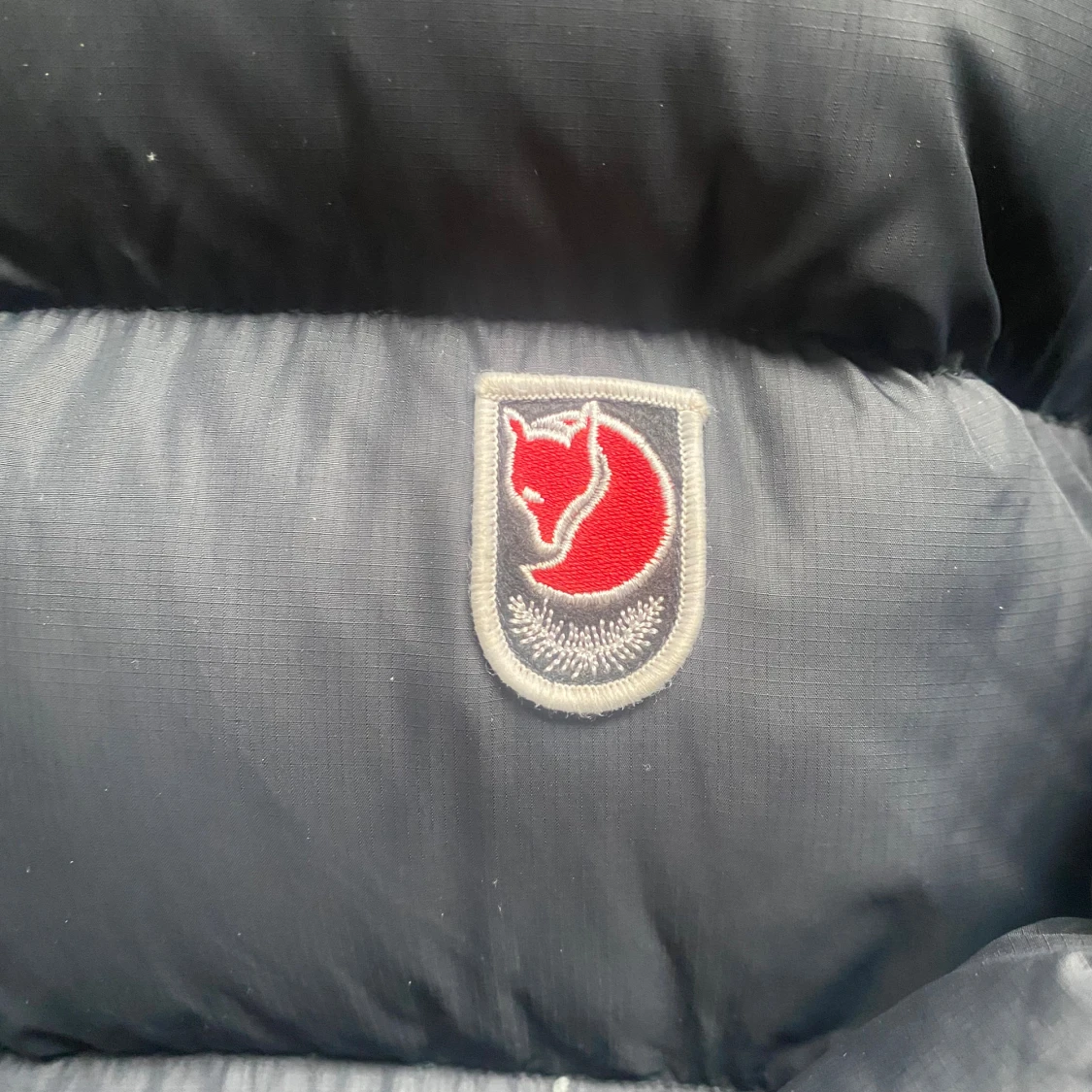 Svart dunjacka från Fjällräven S - 1