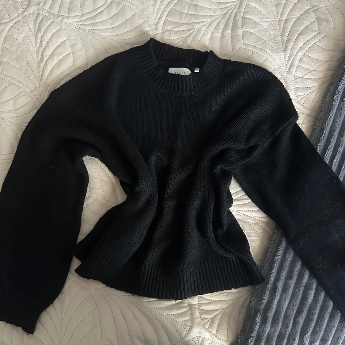 Svart stickad tröja från ADPT XL