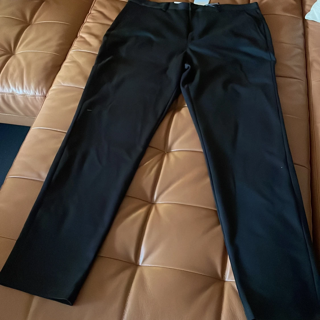 Svarta kostymbyxor med rak passform