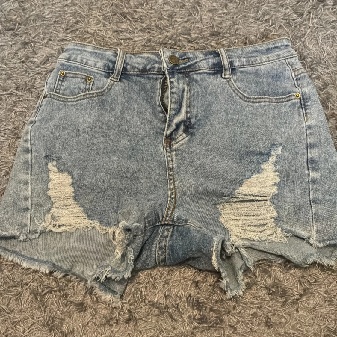 Blå jeansshorts från KIWI, strl M