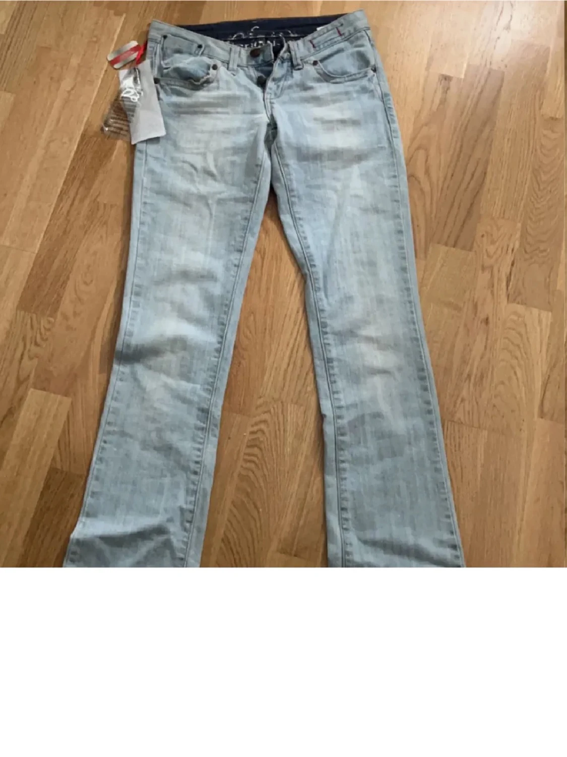  ljusblå bootcut jeans - 1