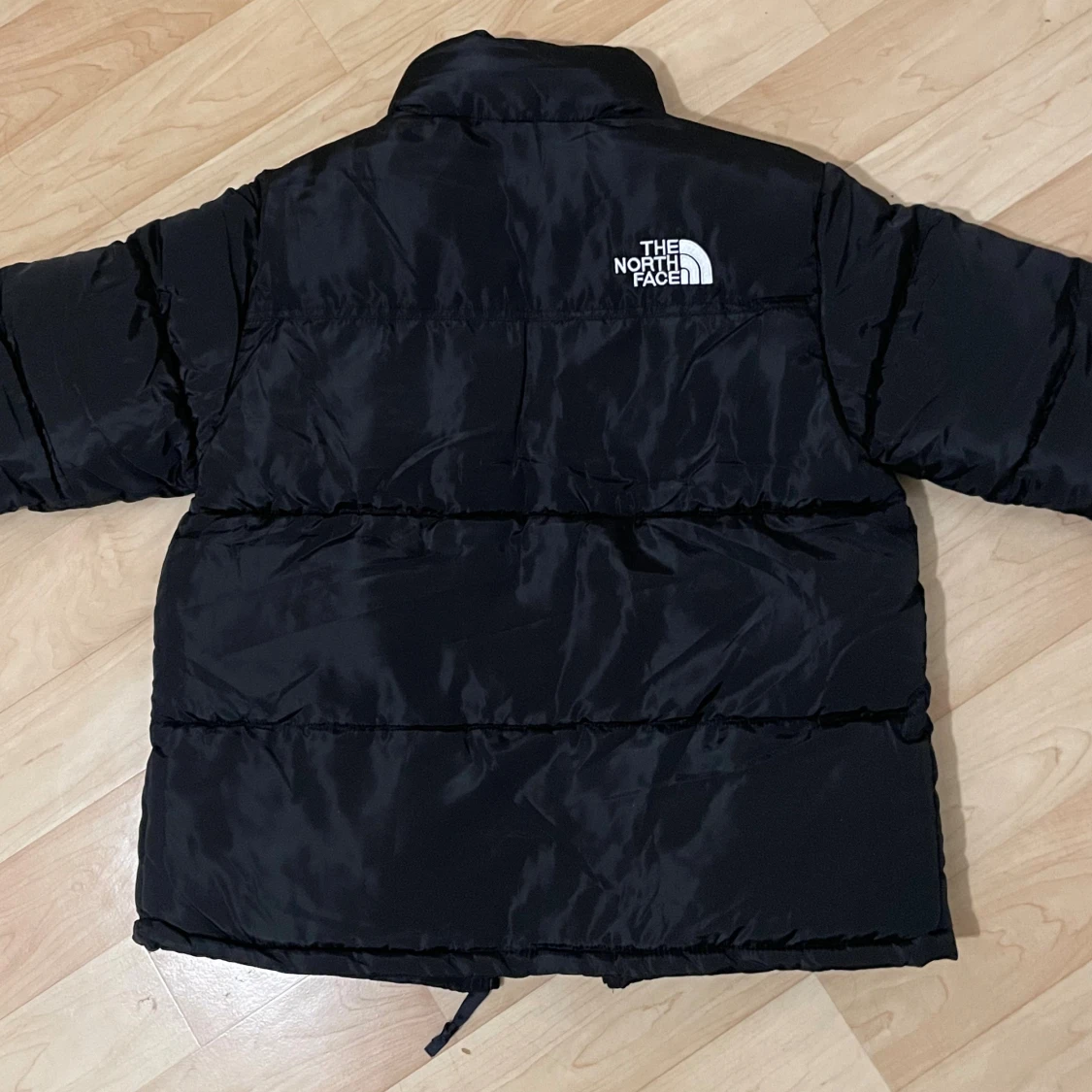 Svart pufferjacka från The North Face - 1