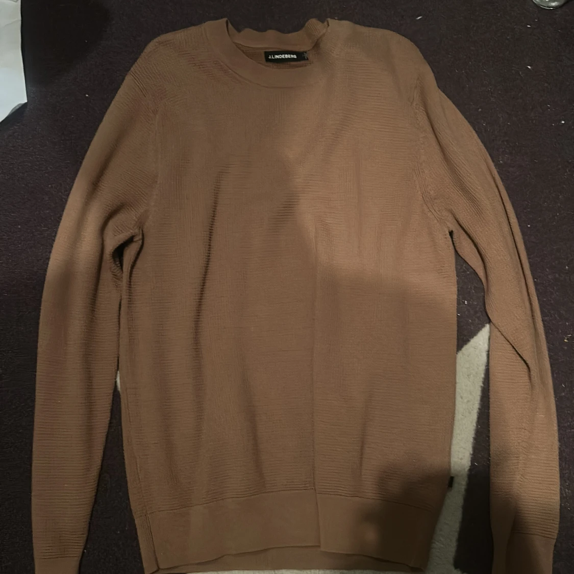 Brun stickad tröja från J.Lindeberg
