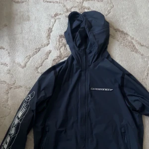  vindjacka från Lacoste   - Jacka från lacoste, storlek m/l