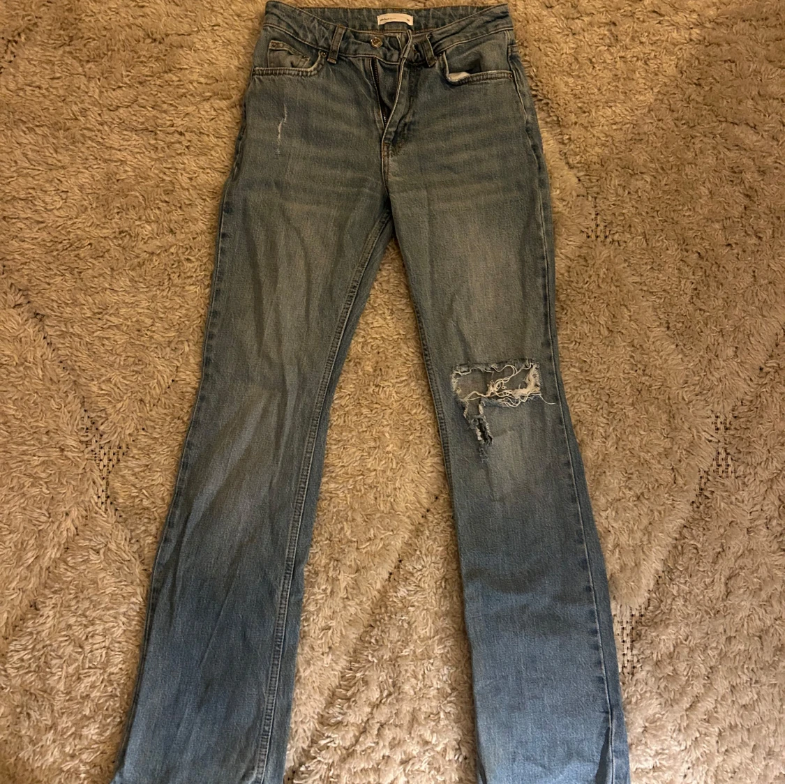 Blå bootcut jeans