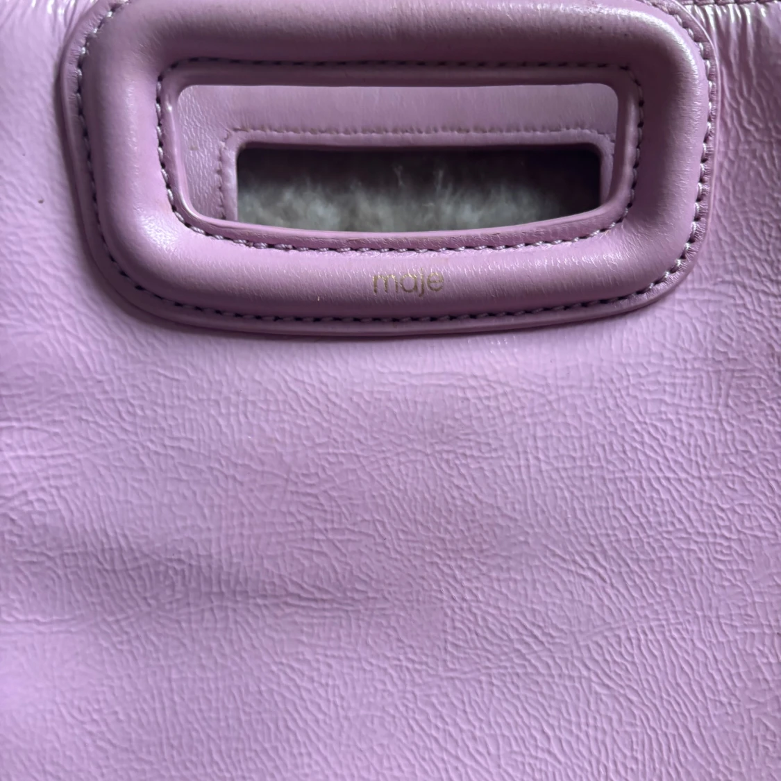 Ljusrosa axelväska med fransar från Maje - 1