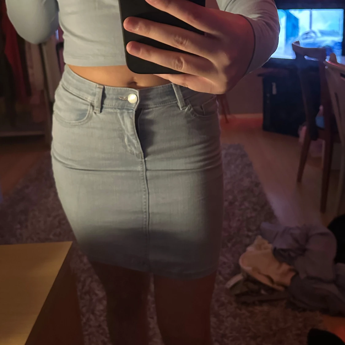 Ljusblå jeanskjol med fickor