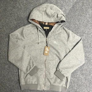 Burberry gray hoodie - Size L. New with tags. Size label says 2XL but it fits L