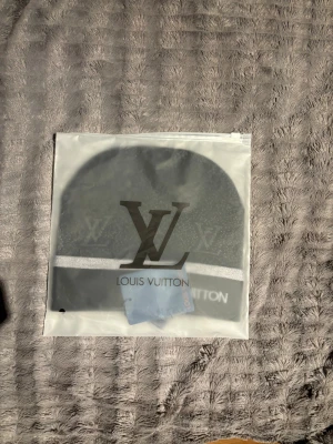 Mössa - Helt ny, tag o dustbag finns 