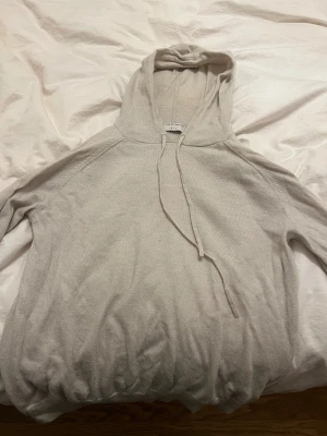 Stickad hoodie från Tiger of Sweden - Fin stickad hoodie från TGS. Storlek M