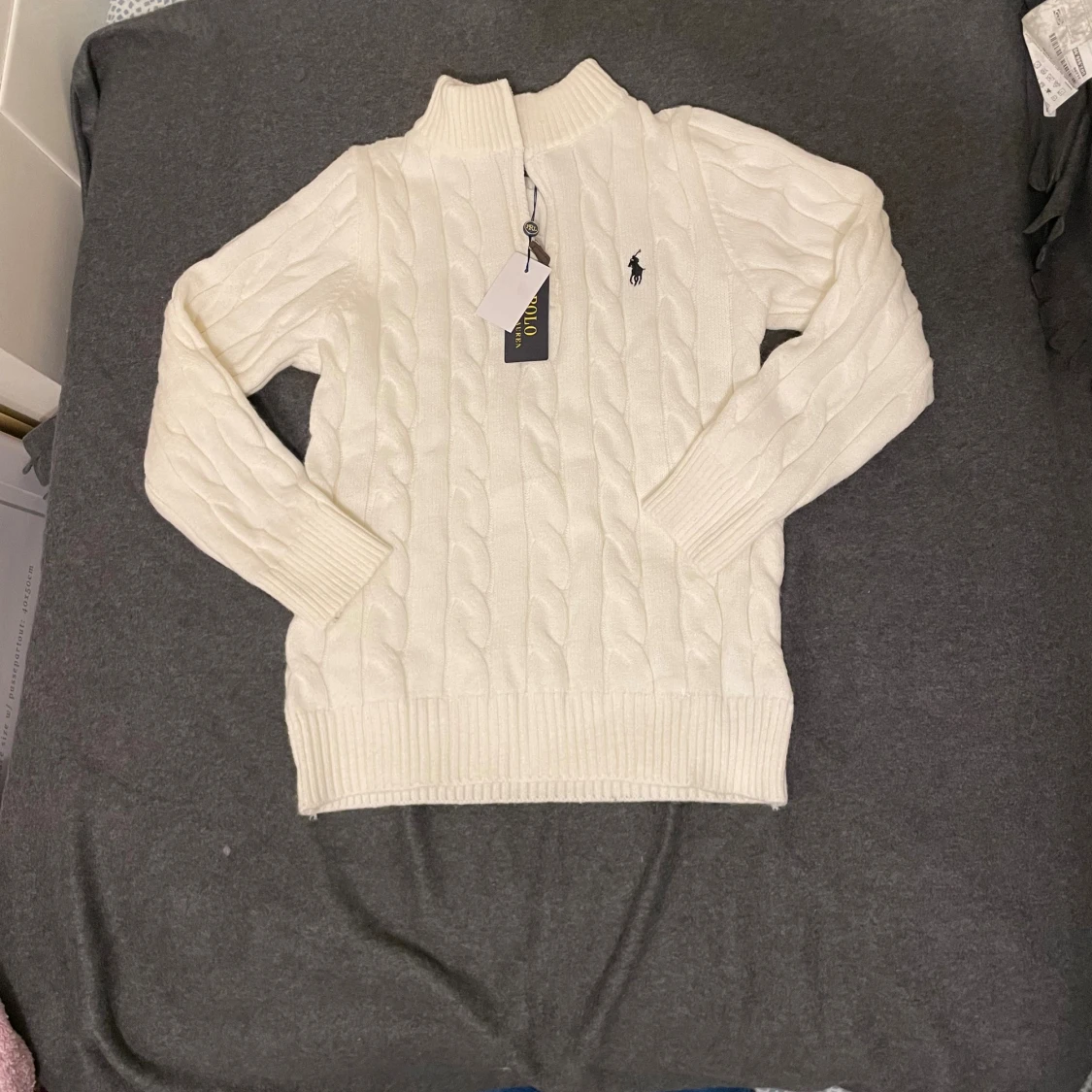 Vit stickad polotröja från Polo Ralph Lauren