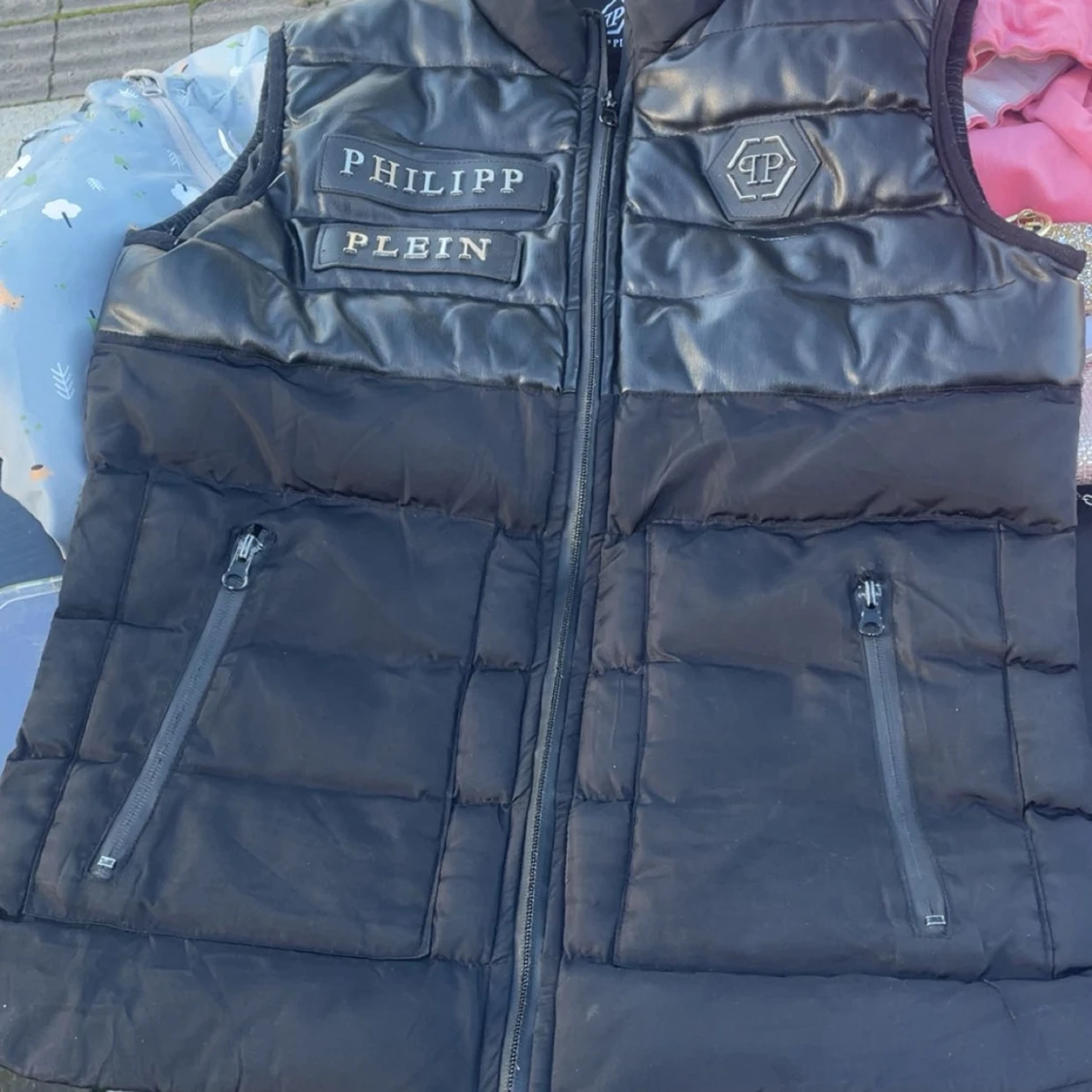 Svart dunväst från Philipp Plein