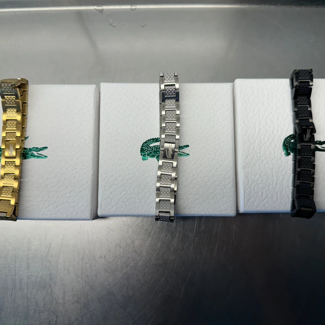 Lacoste länkarmband i guld  - 1