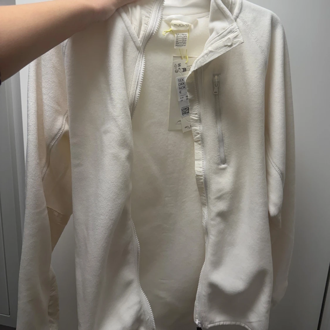 Vit fleecejacka från H&M Move