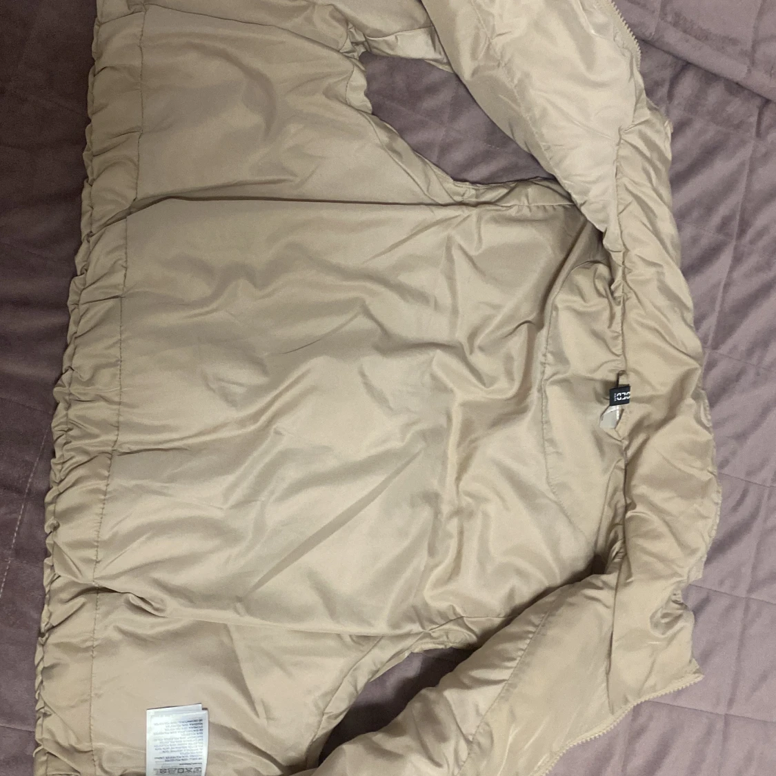 Beige dunväst från H&M Divided - 1