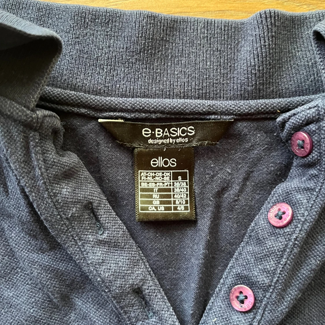 Mörkblå pikétröja  - 1