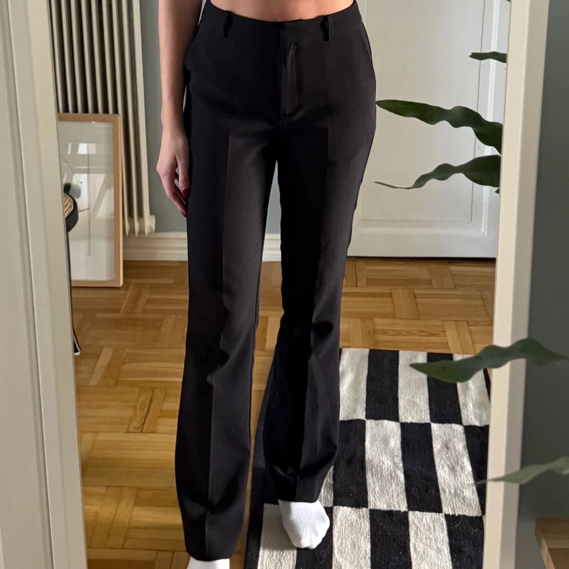 Svarta kostymbyxor