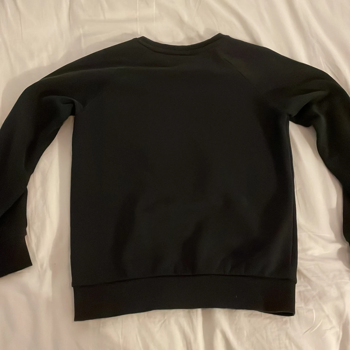 Svart sweatshirt från Peak Performance - 1