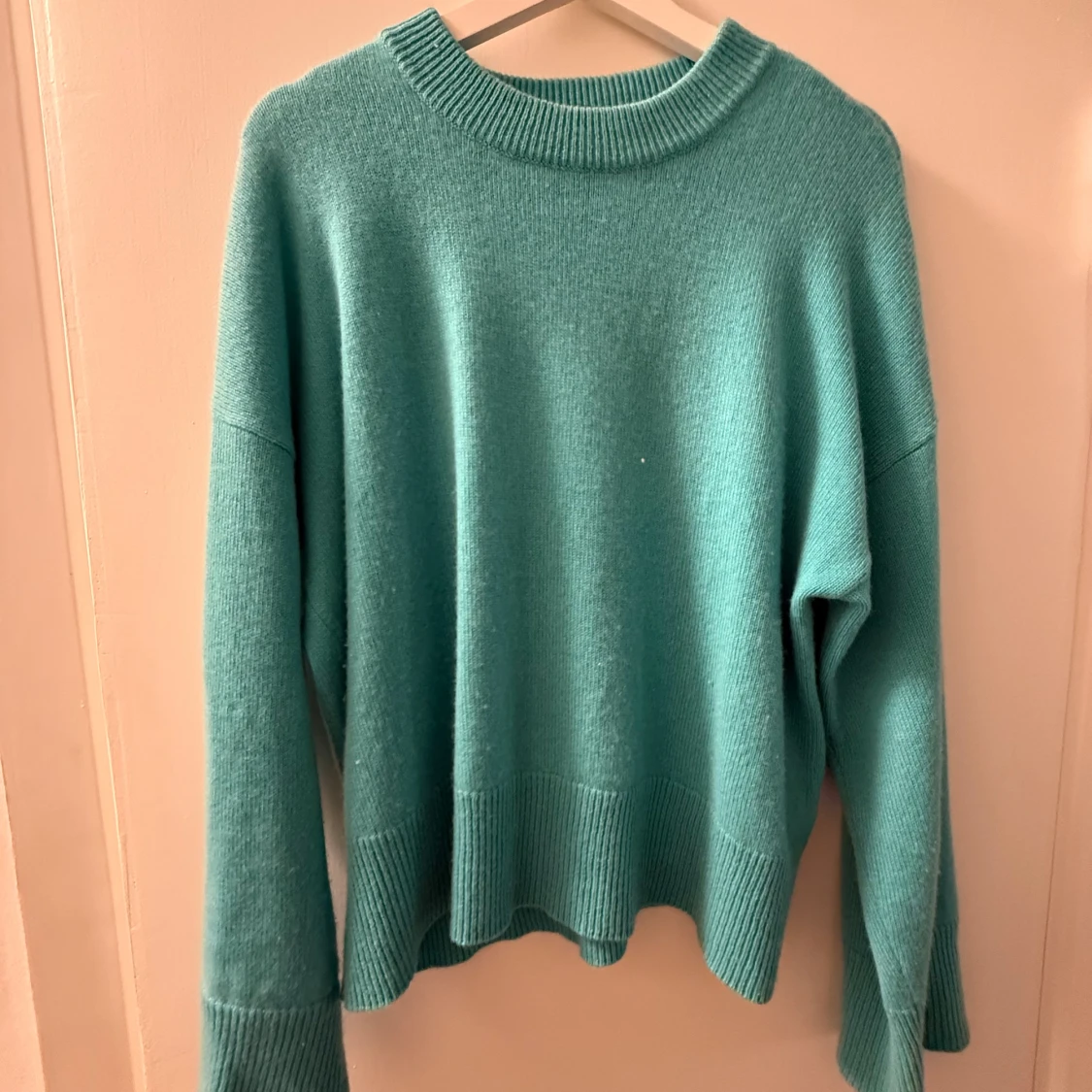 Turkos stickad tröja