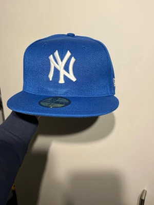 New York New Era Fitted Cap - Blue New York New Era cap  Size: 7-1/2
