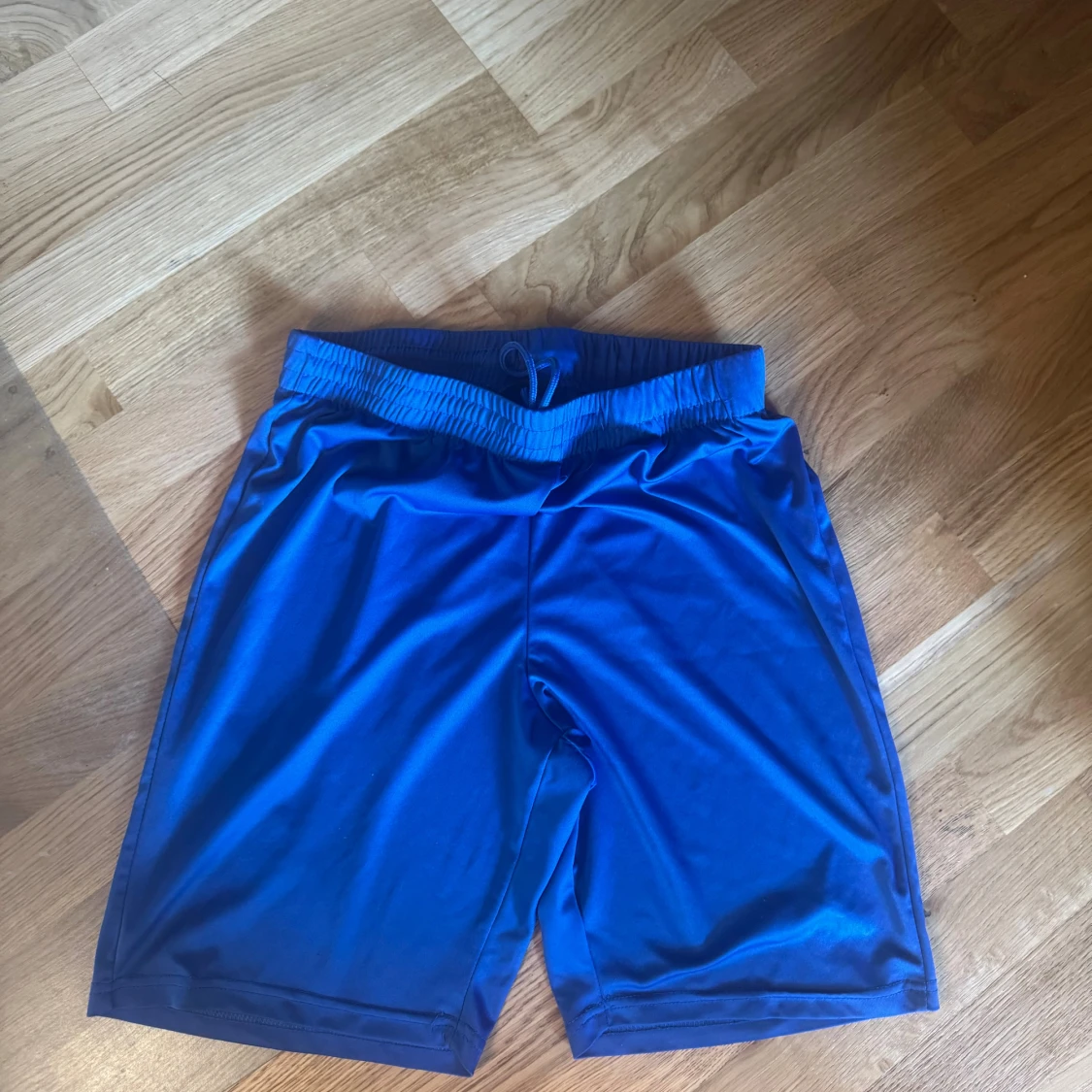 Blå träningsshorts med snörning