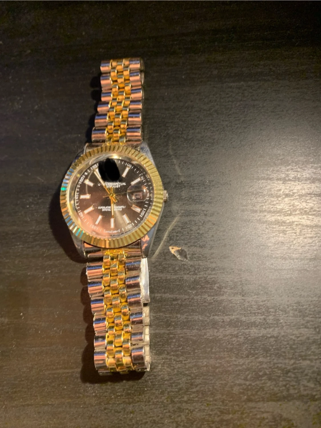 Tvåfärgad klocka från Olevs - 2