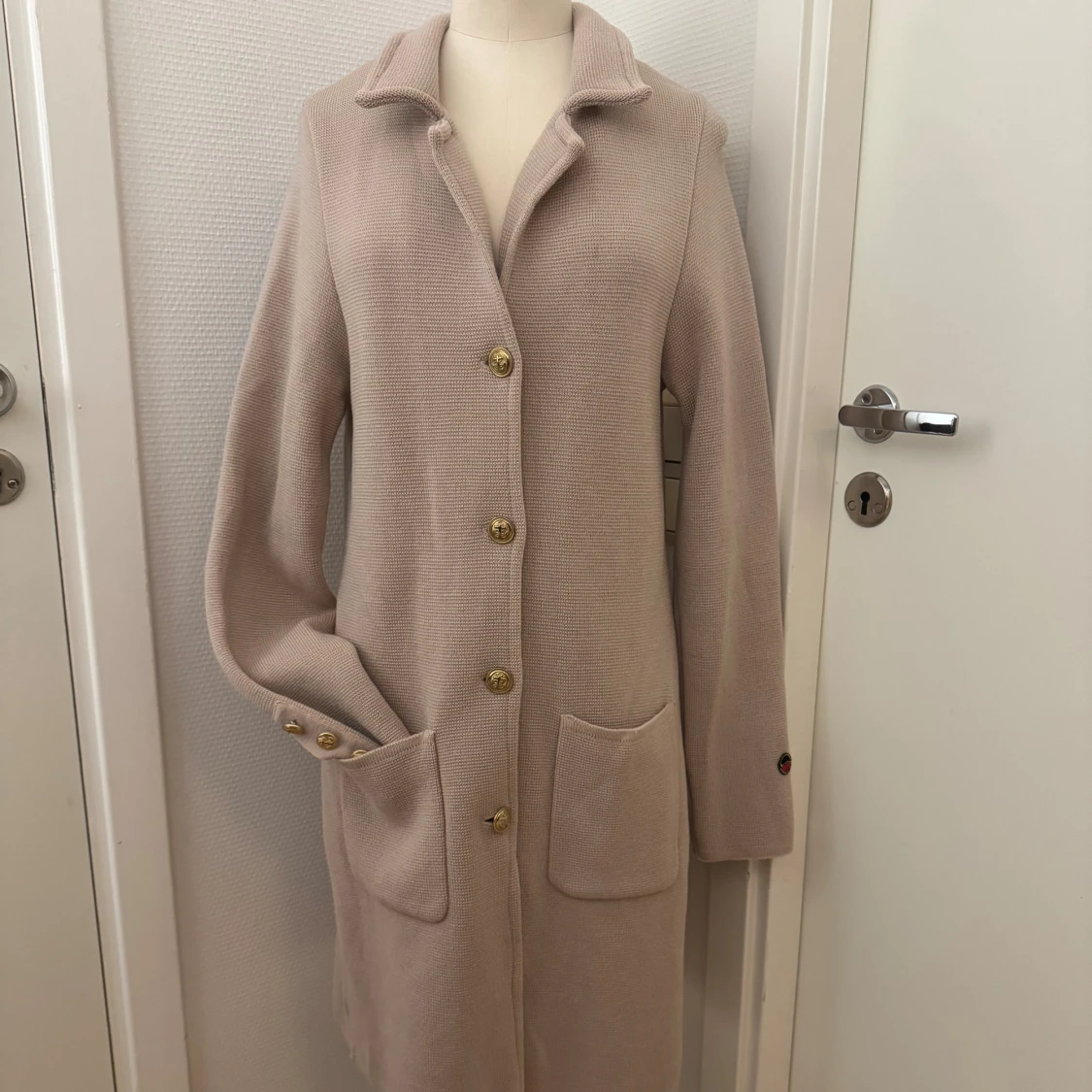 Puderrosa kappa från Busnel