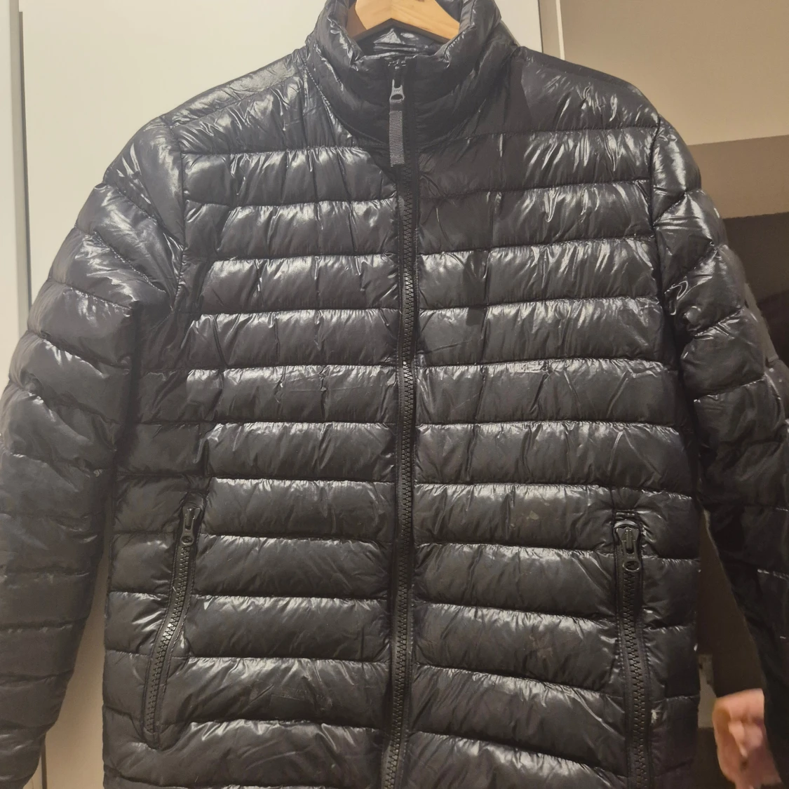 Svart dunjacka Peak Performance M