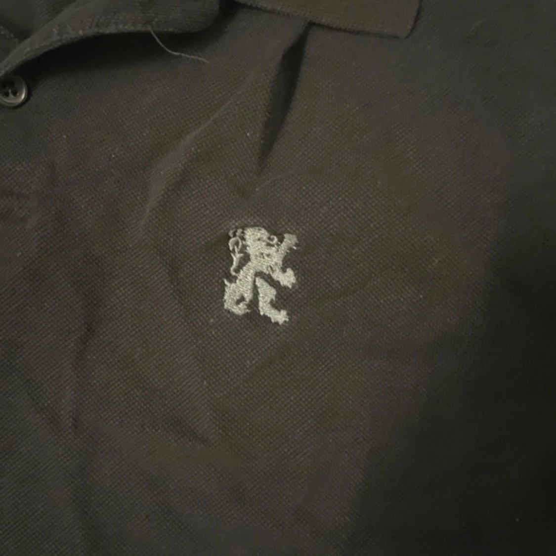 Svart pikétröja från Millbrooke S - 1