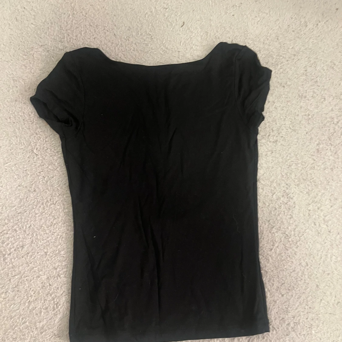 Svart topp med öppen rygg - 1