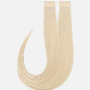 Blonda tape-on hårförlängningar - Långa, raka tape-on hårförlängningar i en ljusblond nyans. Säljer dessa efter en användning men man får me ett nytt sätt med tejp på köpet  o den gamla tejpen är borta, detta e premium löshår o säljer 24 stycken remsor ( tre paket) kan alltid sänka pris 💕