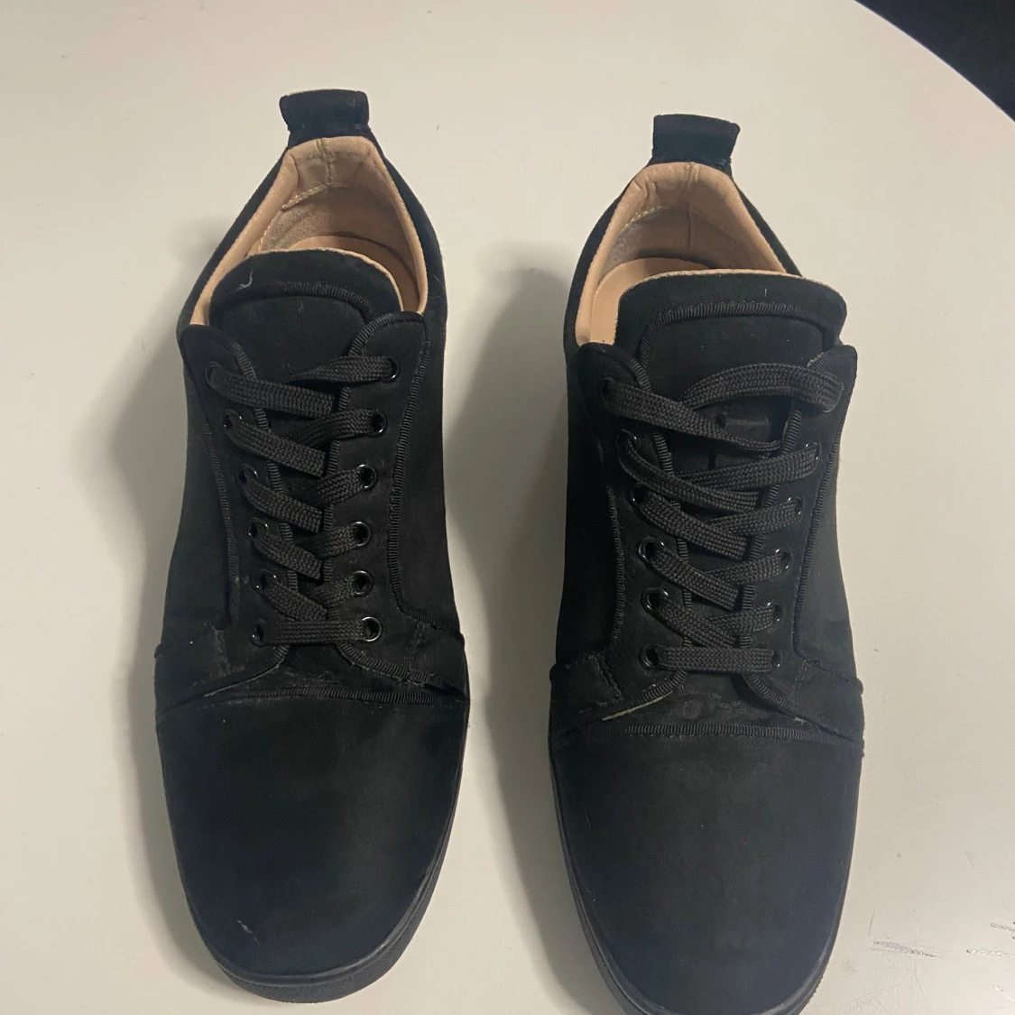 Svarta sneakers från Louboutin - 2