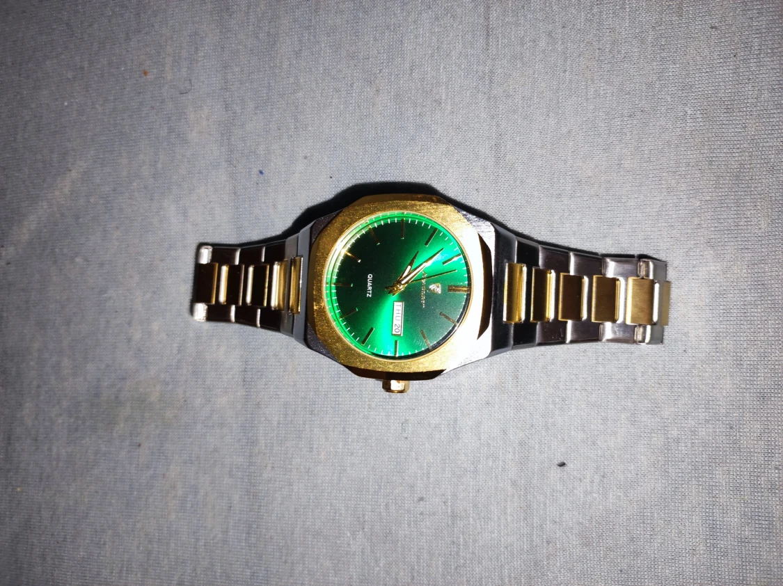 Grön och guld herrklocka podegar