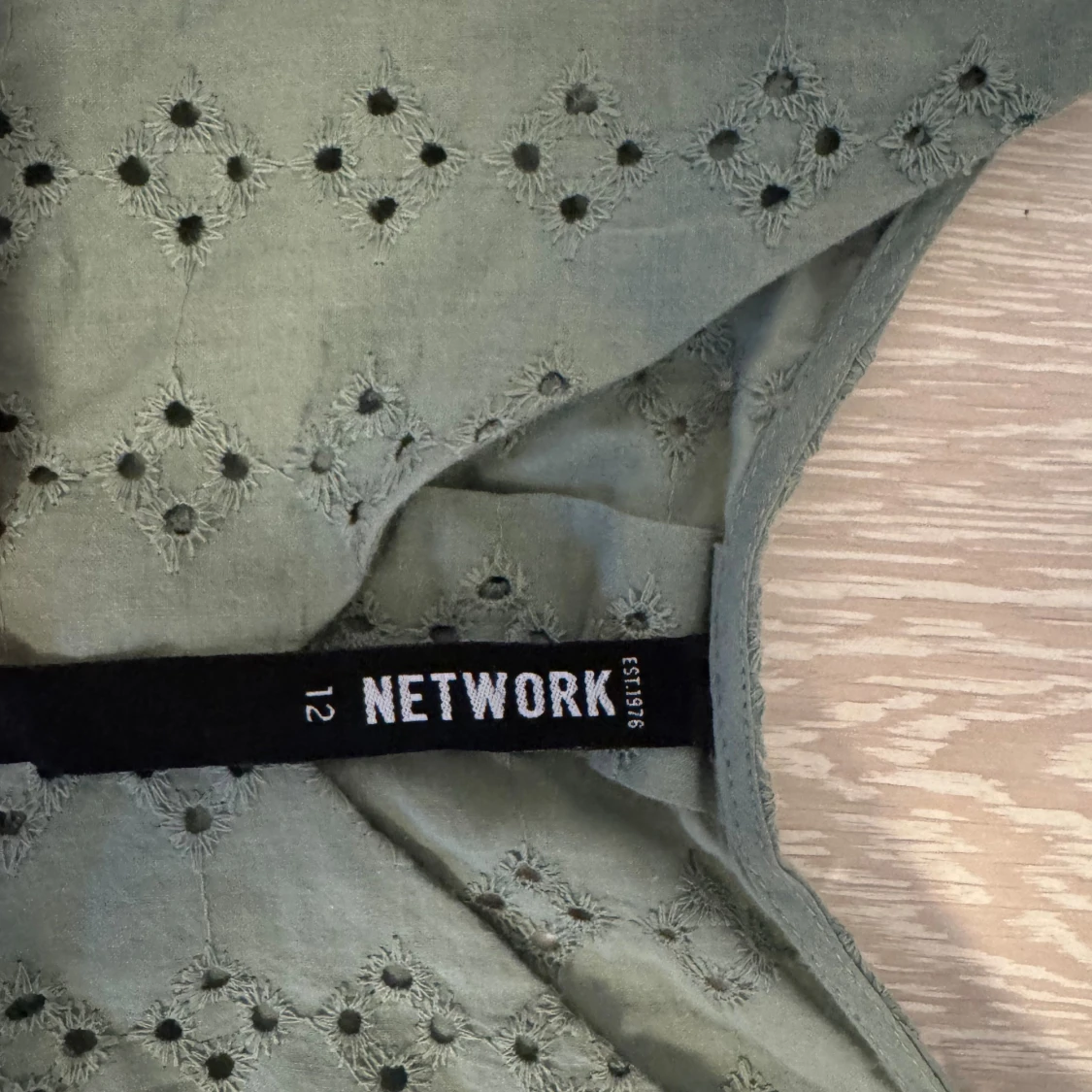 Grön söt topp från network - 2