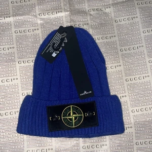 Stone Island vintermössa - Splitterny vintermössa från stone Island.         Finns i Göteborg. Onesize / Unisex 