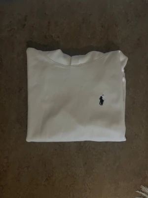 Polo hoddie  - Polo hoddie i storlek S. 