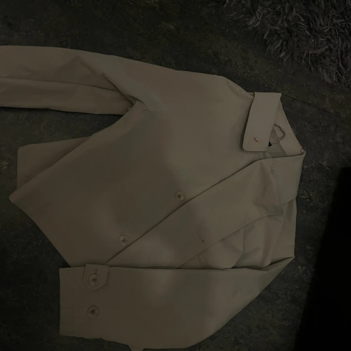 Beige skjorta med knappar