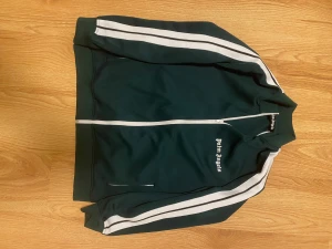 Palm Angels gröna tracksuit L - Palm angels tracksuit mörkgrön byxorna e lite använda men tröja e helt ny size L