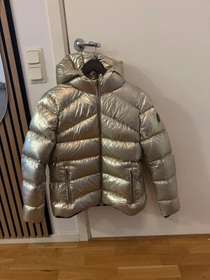 Colmar jacka - Lite sliten i färgen på några ställen.