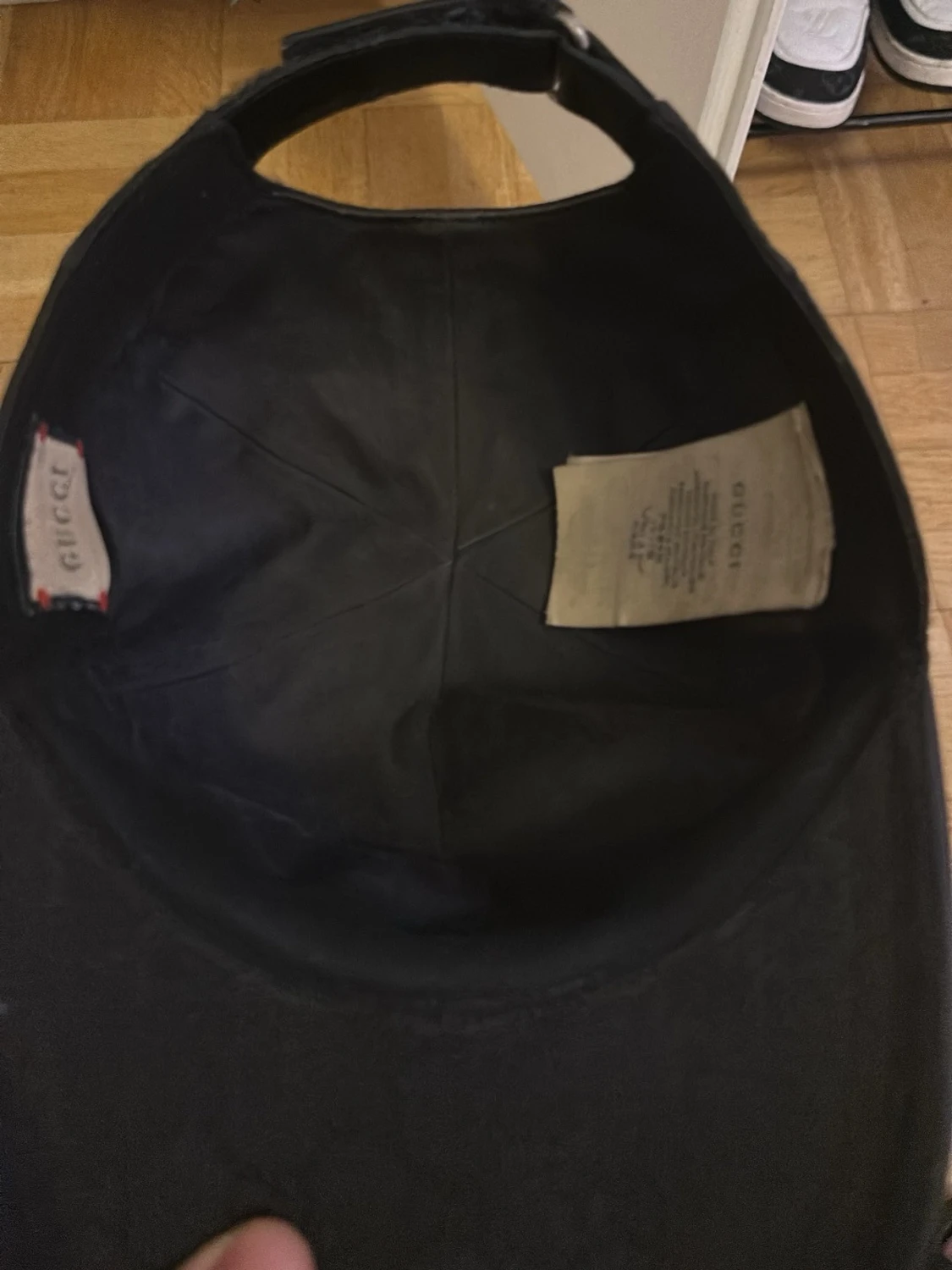 Svart keps från Gucci med GG-mönster - 1