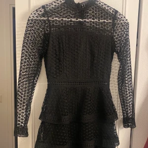 Svart klänning  - Svart klänning som ej passar längre 