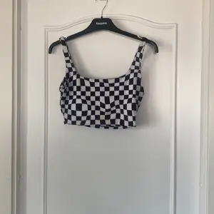 Ball topp i checkerboard mönster 