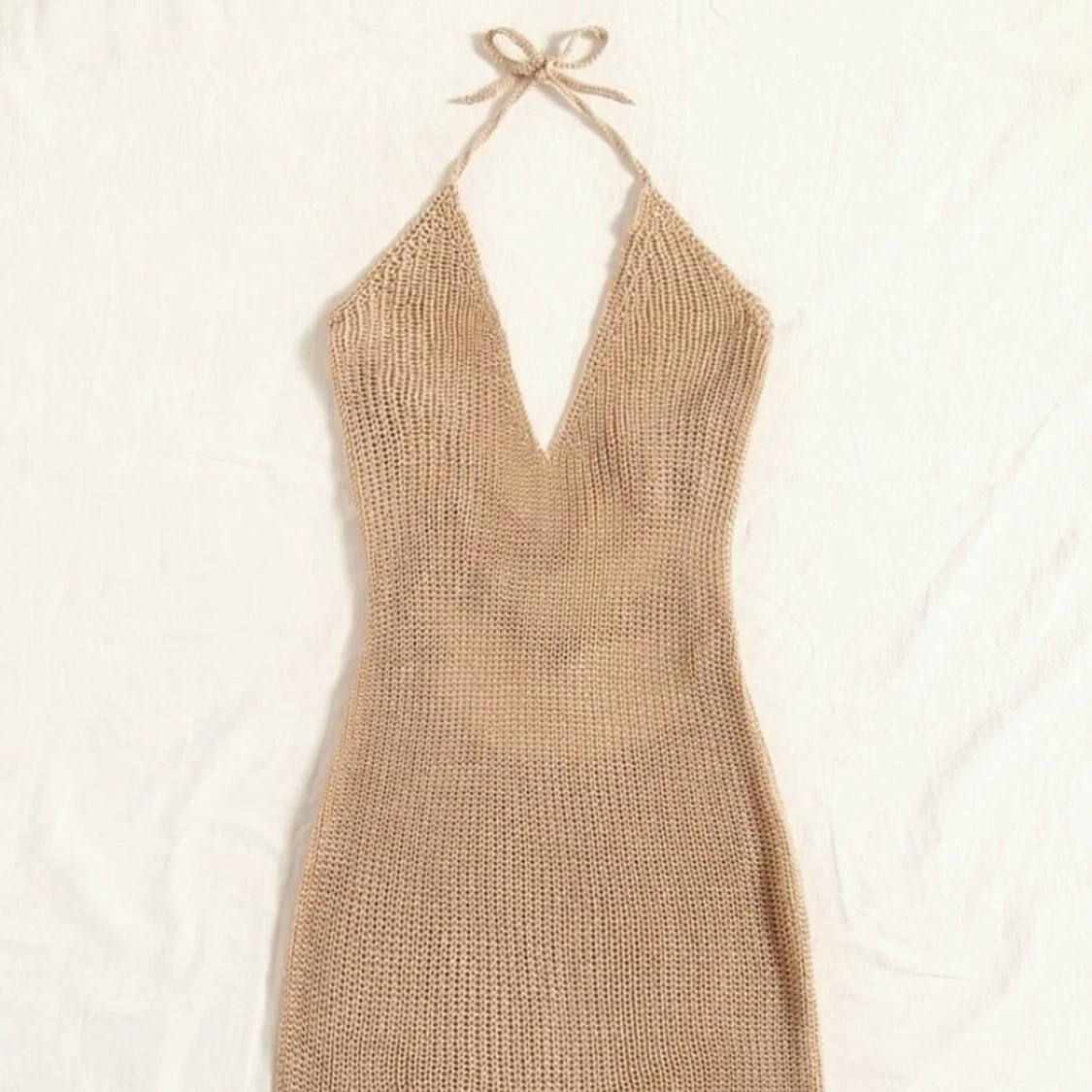 Stickad strandklänning