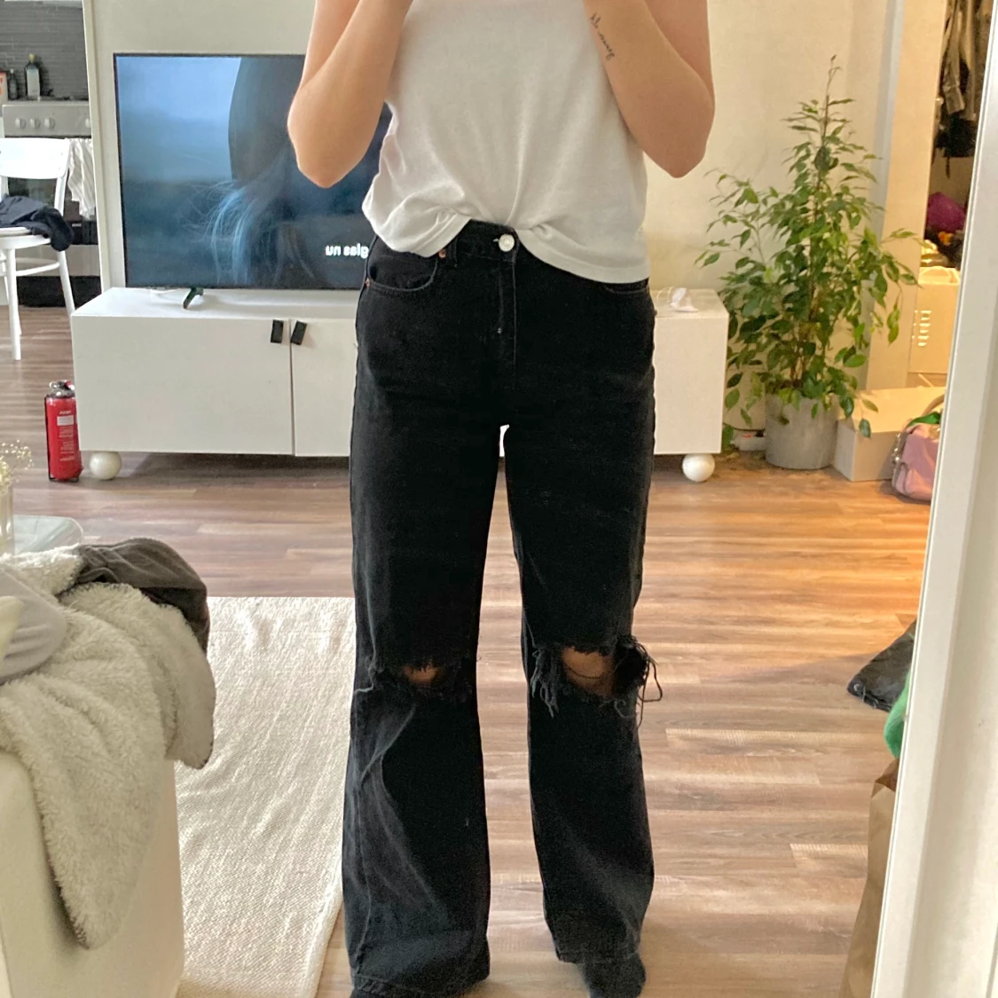 Svarta utsvängda jeans  - 90