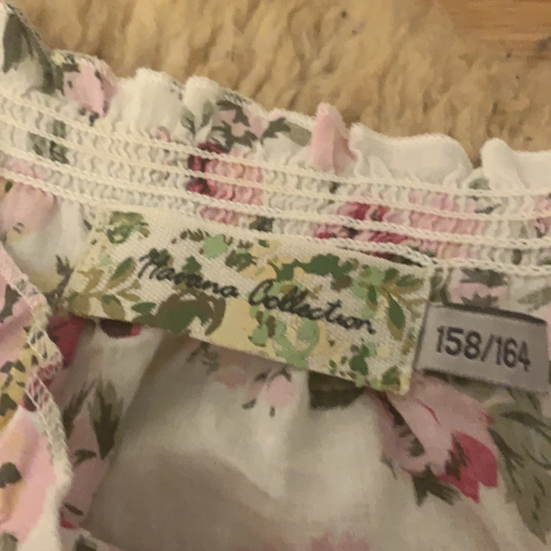 Ett linne med blommor på storlek 158/164 - 91